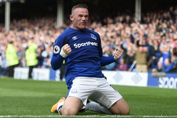 Evertons English striker Wayne Rooney Evertons English striker Wayne Rooney
