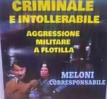 Al corteo di Milano fotomontaggio choc con Meloni vestita da gerarca nazista