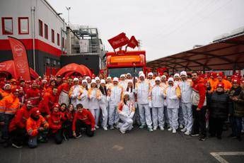 Milano Cortina Fiamma Olimpica a Vicenza Coca Cola accende percorso sport musica e condivisione