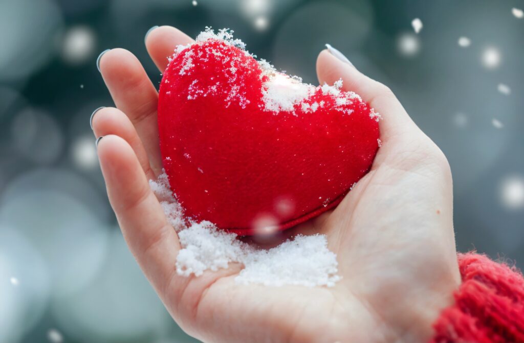 view hand holding red heart symbolizing affection feelings